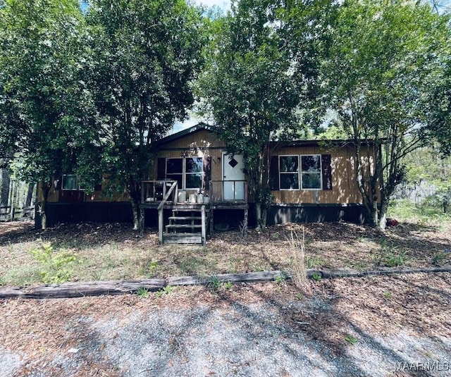 view of front of home with a wooden deck