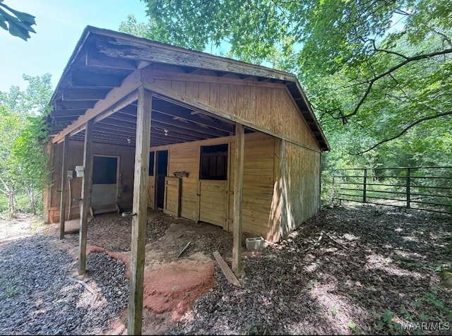 view of outdoor structure featuring an exterior structure and an outbuilding