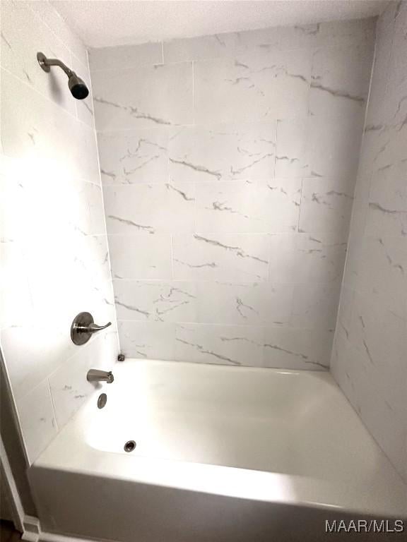 bathroom featuring bathtub / shower combination