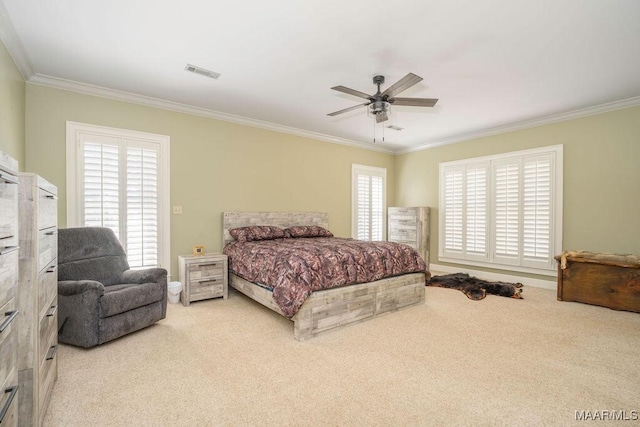2714 County Road 54, Ozark, AL 36360 - carpeted bedroom with a ceiling fan, crown molding, multiple windows, and visible vents
