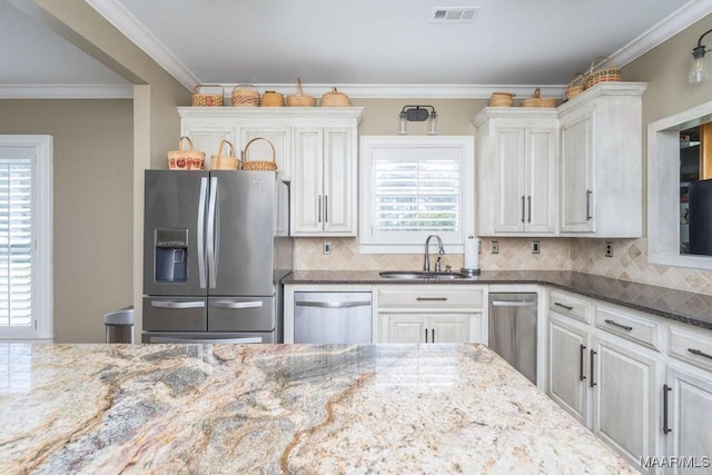2714 County Road 54, Ozark, AL 36360 - kitchen with a sink, stainless steel appliances, plenty of natural light, and visible vents