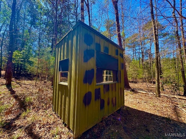 2714 County Road 54, Ozark, AL 36360 - view of shed featuring a wooded view