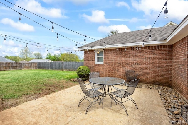 view of patio featuring a fenced backyard and outdoor dining space