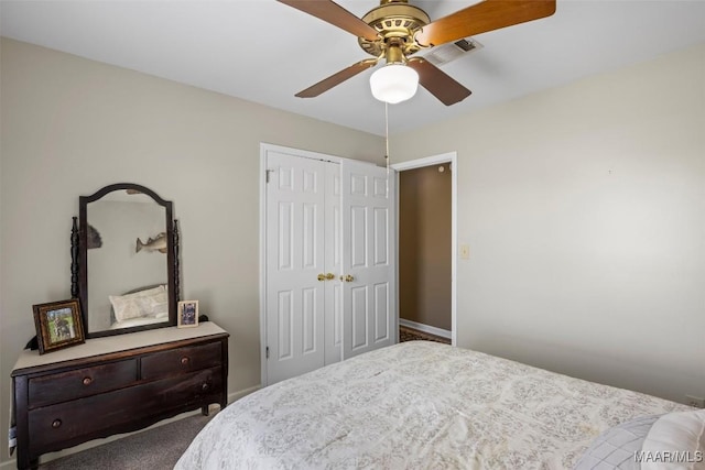 bedroom featuring a closet and a ceiling fan