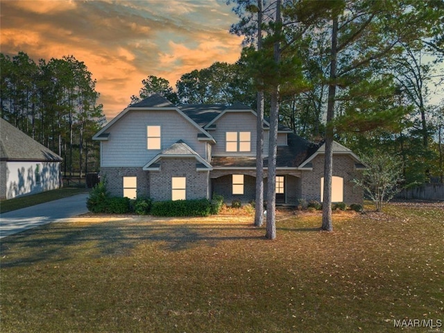 126 N Dogwood Ter, Wetumpka, AL 36093 - view of front of property featuring brick siding and a front lawn