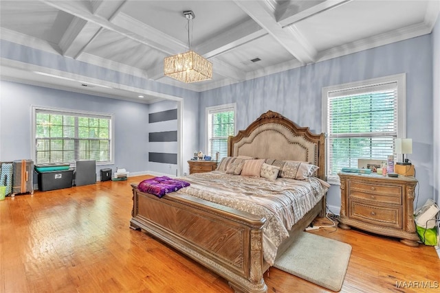 126 N Dogwood Ter, Wetumpka, AL 36093 - bedroom featuring wood finished floors, a chandelier, multiple windows, beamed ceiling, and coffered ceiling