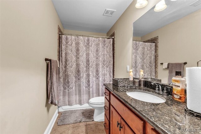 126 N Dogwood Ter, Wetumpka, AL 36093 - full bath with toilet, vanity, tile patterned floors, and curtained shower