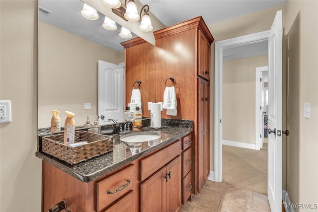 126 N Dogwood Ter, Wetumpka, AL 36093 - bathroom with vanity, baseboards, and tile patterned floors