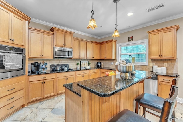 126 N Dogwood Ter, Wetumpka, AL 36093 - kitchen featuring wall oven, stainless steel microwave, ornamental molding, decorative backsplash, and a kitchen island