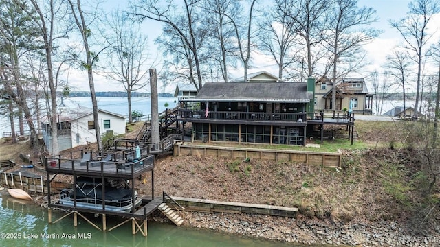 197 Maple Ridge Rd, Alexander City, AL 35010 - rear view of house with stairs and a deck with water view