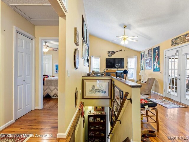 197 Maple Ridge Rd, Alexander City, AL 35010 - dining area featuring lofted ceiling, wood finished floors, french doors, and a ceiling fan