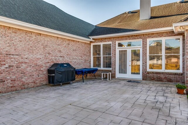 view of patio featuring grilling area and french doors