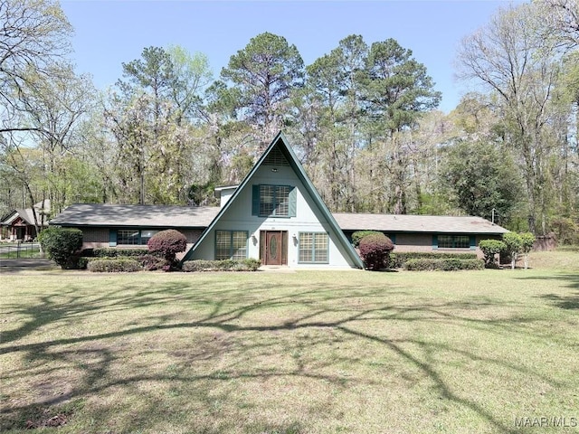 801 Noble Rd, Tallassee, AL 36078 - a-frame style home with a front lawn