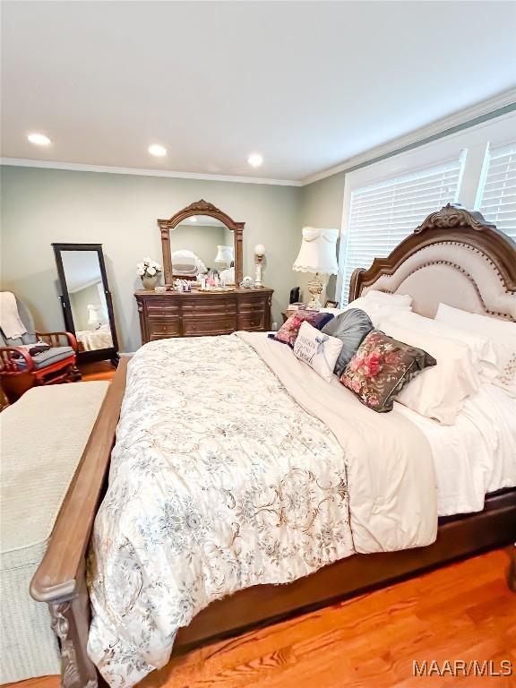 101 Hooper Dr, Selma, AL 36701 - bedroom with wood finished floors, ornamental molding, and recessed lighting