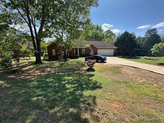 1518 White Cloud Dr, Deatsville, AL 36022 - ranch-style home with a front lawn, an attached garage, and concrete driveway