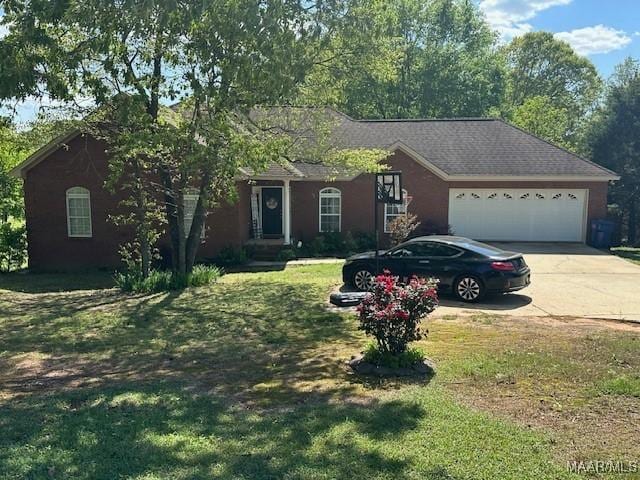 1518 White Cloud Dr, Deatsville, AL 36022 - ranch-style house with a front yard, roof with shingles, driveway, and an attached garage