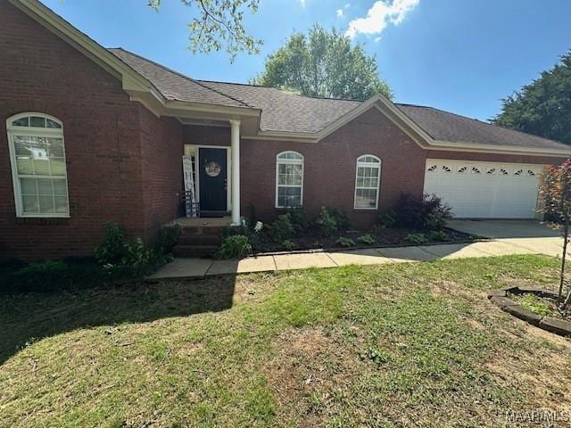 1518 White Cloud Dr, Deatsville, AL 36022 - ranch-style home with a garage, brick siding, driveway, and a front lawn