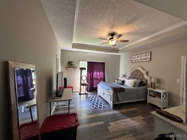 1518 White Cloud Dr, Deatsville, AL 36022 - bedroom featuring crown molding, a textured ceiling, a ceiling fan, wood finished floors, and a raised ceiling