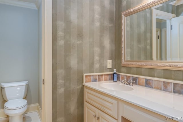 8573 W Hampton Ct, Montgomery, AL 36117 - half bath featuring toilet, crown molding, vanity, and baseboards