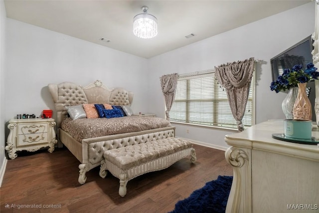 bedroom featuring dark wood-style flooring, visible vents, and baseboards