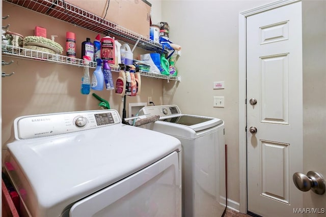 laundry area featuring laundry area and washing machine and clothes dryer