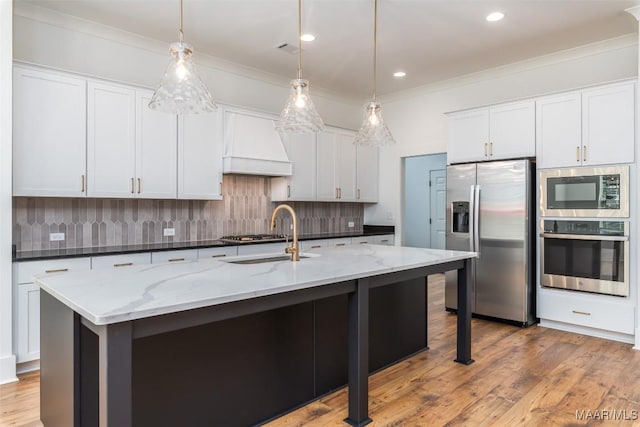 kitchen featuring stainless steel appliances, premium range hood, backsplash, and crown molding