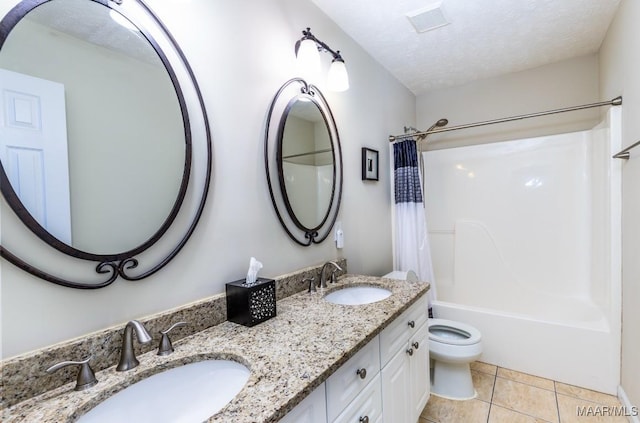 full bath featuring toilet, tile patterned floors, shower / bathtub combination with curtain, and a sink
