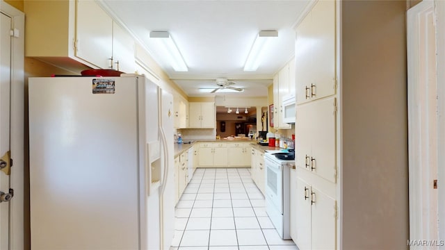kitchen with light countertops, a ceiling fan, white appliances, white cabinetry, and light tile patterned flooring