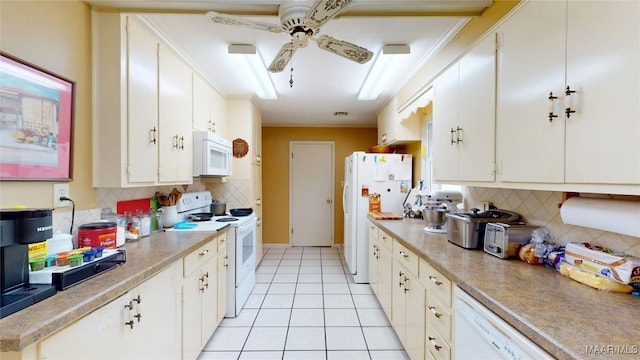 kitchen featuring light tile patterned floors, white appliances, a ceiling fan, white cabinetry, and decorative backsplash