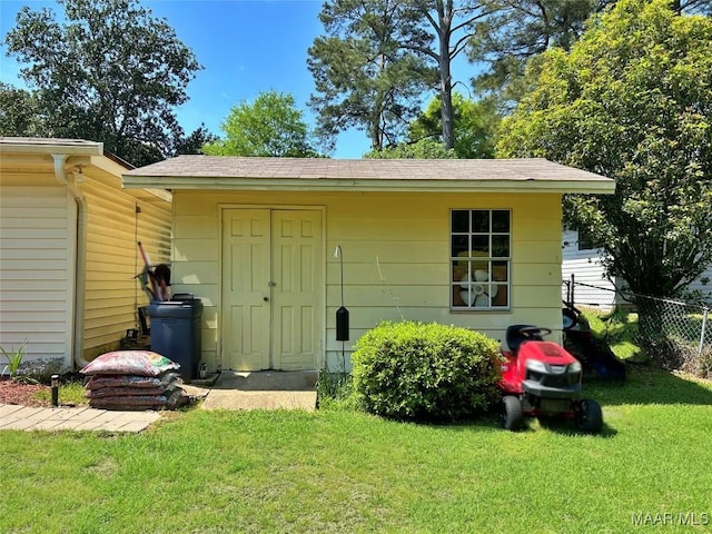 view of outdoor structure with fence