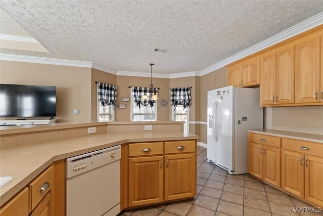 kitchen featuring ornamental molding, a chandelier, white appliances, light countertops, and light tile patterned flooring