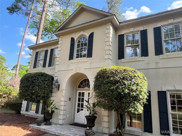 exterior space with stucco siding