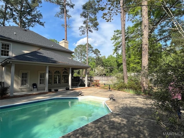 view of pool with fence, a patio area, and a fenced in pool