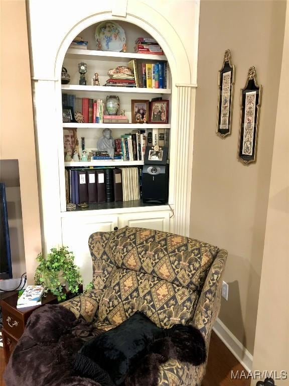living area with wood finished floors