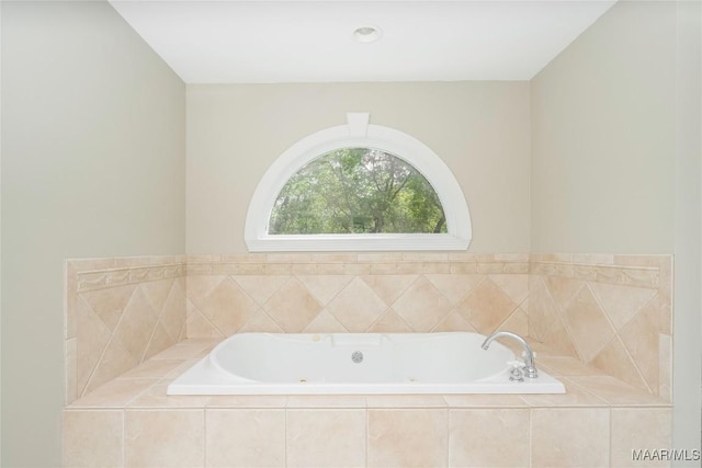 bathroom with a garden tub