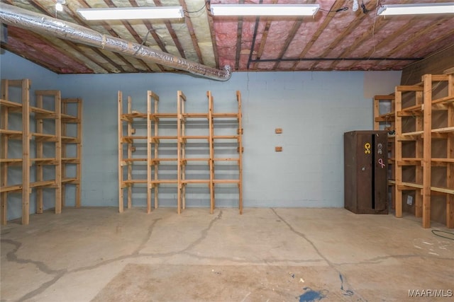 interior space featuring concrete block wall