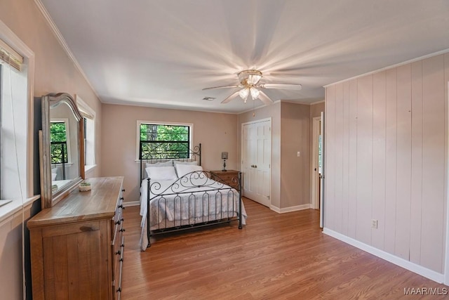 210 Weluvit Ln, Titus, AL 36080 - bedroom with light wood-style floors, baseboards, ceiling fan, and ornamental molding