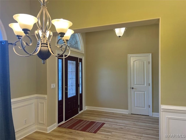 79 Forest Hill Ct, Wetumpka, AL 36093 - entryway featuring a chandelier and wood finished floors