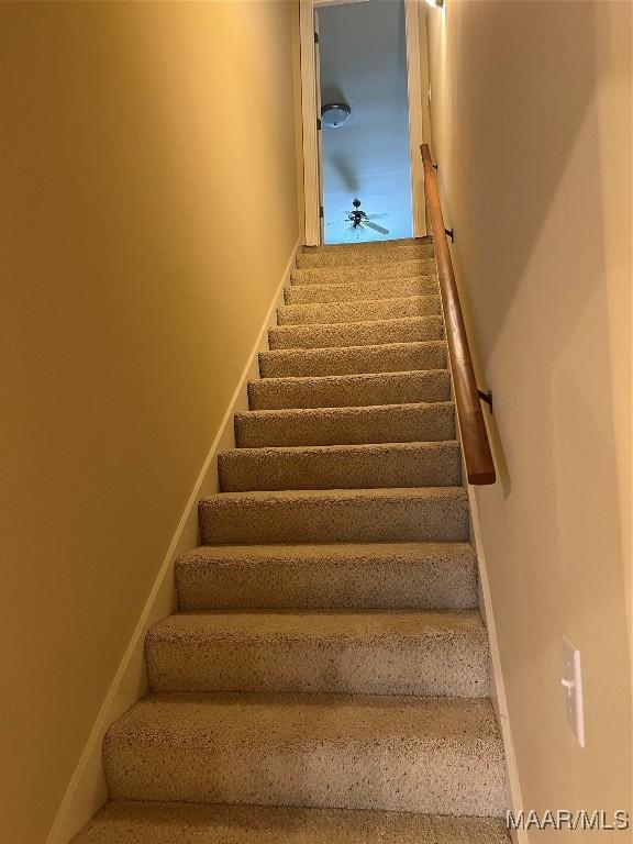 staircase with baseboards