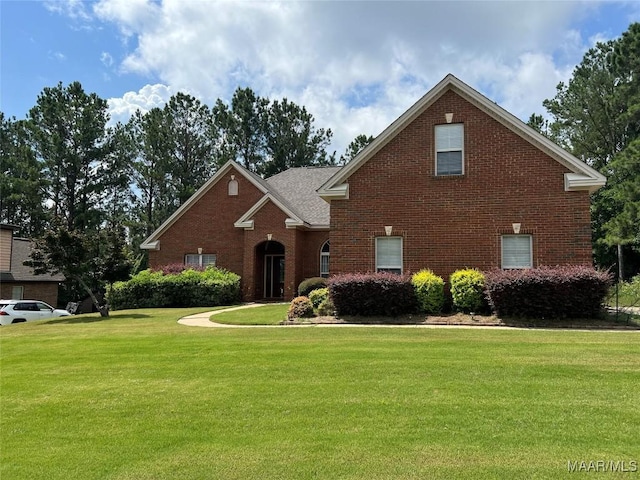 79 Forest Hill Ct, Wetumpka, AL 36093 - traditional-style home featuring brick siding and a front lawn