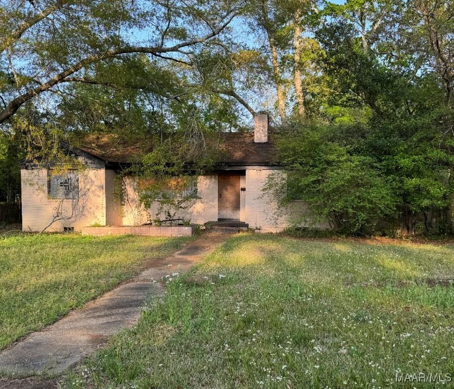 3405 Gilmer Ave, Montgomery, AL 36105 - view of front of property with a front yard and a chimney