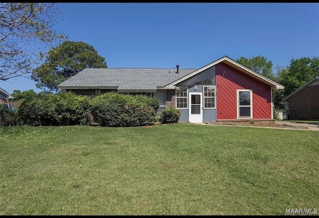 513 Gardendale Dr, Montgomery, AL 36110 - view of front facade with a front yard and roof with shingles