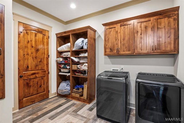 177 Tankersley Rd, Wetumpka, AL 36092 - laundry room with ornamental molding, light wood finished floors, recessed lighting, cabinet space, and washer and clothes dryer