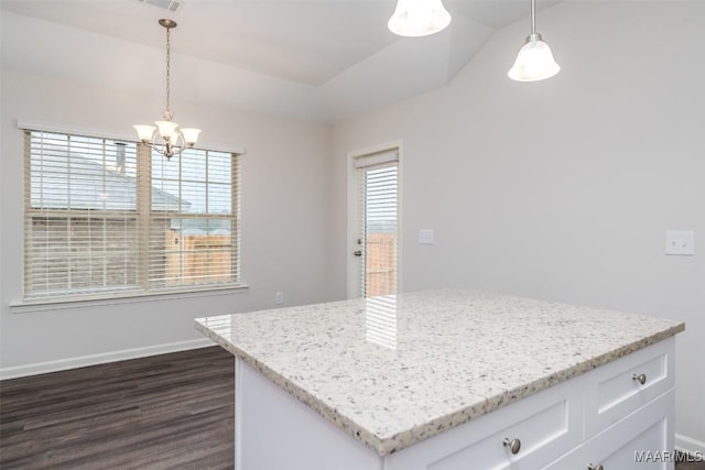 2047 Dawsons Mill Ln, Prattville, AL 36067 - kitchen with a notable chandelier, light stone countertops, dark wood-style flooring, and hanging light fixtures