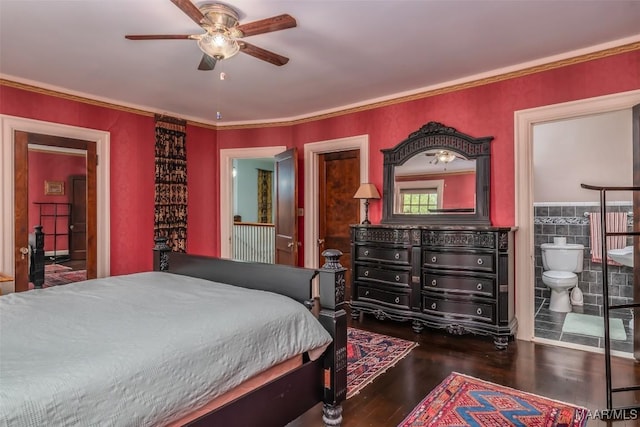 bedroom with ensuite bath, ornamental molding, a ceiling fan, and wood finished floors