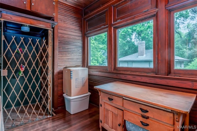 room details with wood walls and wood finished floors