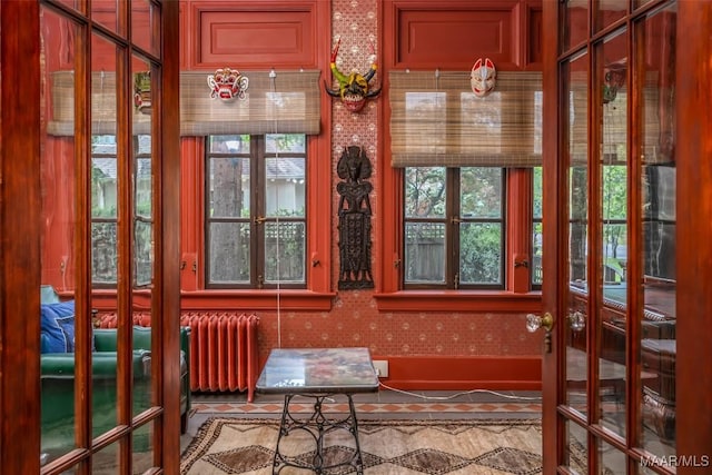 sunroom / solarium with radiator heating unit