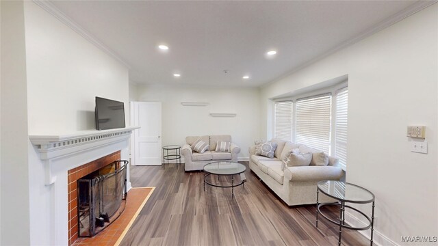 2045 Gorgas St, Montgomery, AL 36106 - living room with recessed lighting, a fireplace, ornamental molding, and wood finished floors