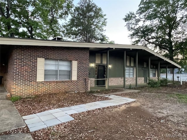 ranch-style home with brick siding