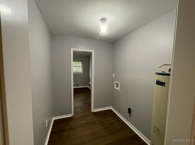 laundry area featuring baseboards, laundry area, dark wood-style floors, gas water heater, and hookup for a washing machine